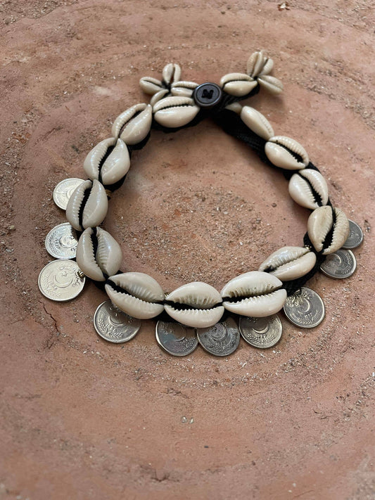 Cowrie shell necklace and vintage coins
