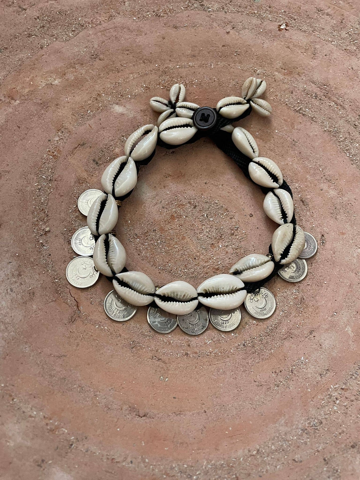 Cowrie shell necklace and vintage coins